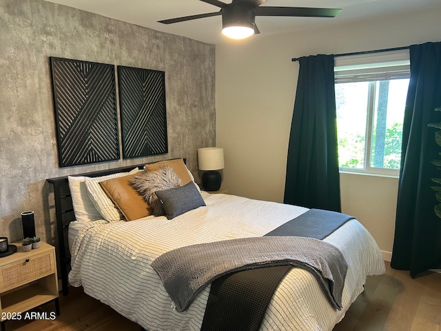 7802 E Hubbell St, Scottsdale, AZ 85257 - bedroom featuring wood finished floors and a ceiling fan