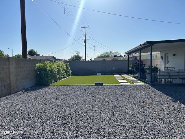 7802 E Hubbell St, Scottsdale, AZ 85257 - fenced backyard with a patio area