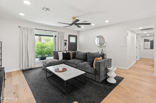 7802 E Hubbell St, Scottsdale, AZ 85257 - living room featuring recessed lighting, light wood-type flooring, ceiling fan, and baseboards