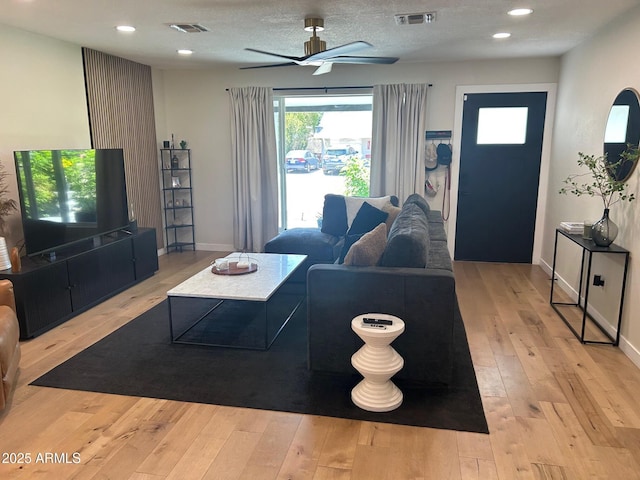 7802 E Hubbell St, Scottsdale, AZ 85257 - living area with a ceiling fan, light wood-type flooring, recessed lighting, and baseboards