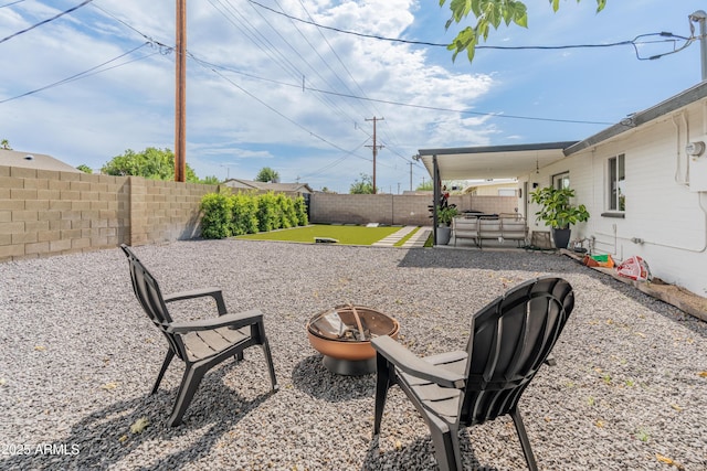 7802 E Hubbell St, Scottsdale, AZ 85257 - fenced backyard with a fire pit and a patio