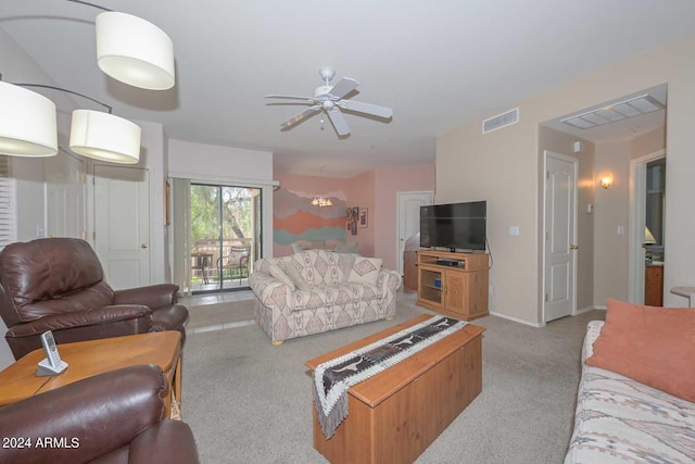 living room with carpet and ceiling fan