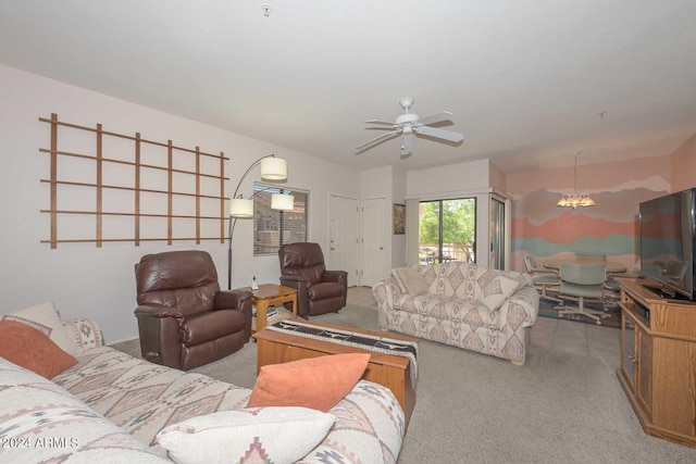 living room with carpet and ceiling fan