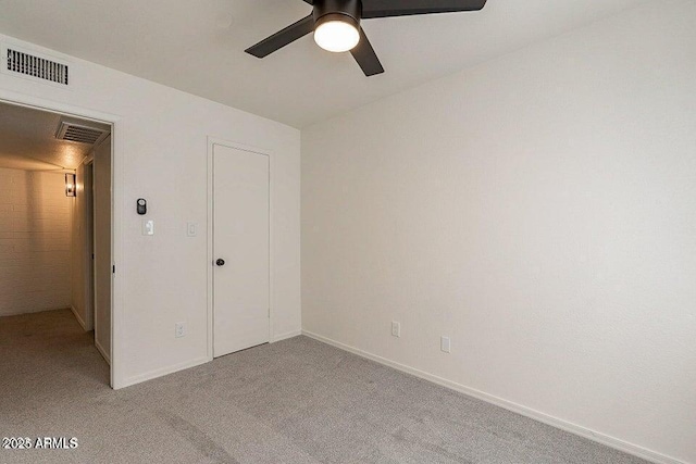 4268 N 68th Ave, Phoenix, AZ 85033 - unfurnished bedroom featuring carpet floors and ceiling fan
