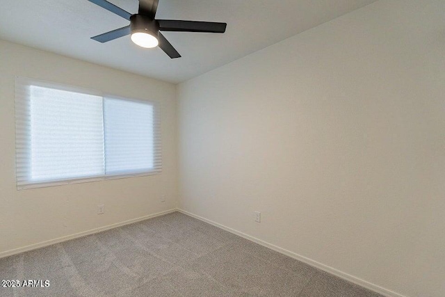 4268 N 68th Ave, Phoenix, AZ 85033 - spare room with ceiling fan and light colored carpet