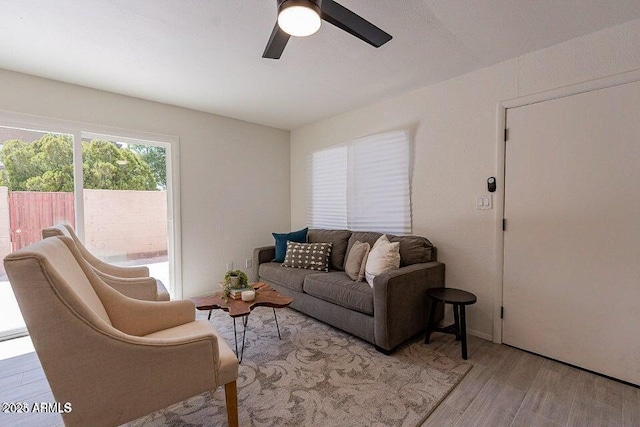 4268 N 68th Ave, Phoenix, AZ 85033 - living area with wood finished floors and ceiling fan