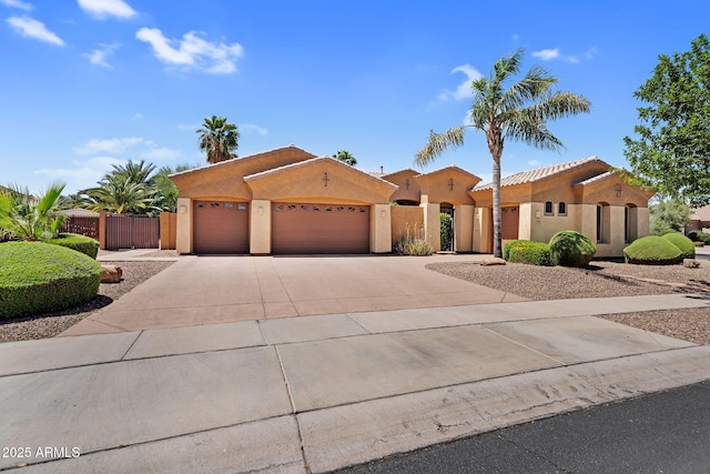 4204 S Winter Ln, Gilbert, AZ 85297 - view of front of home with stucco siding, driveway, fence, and a garage