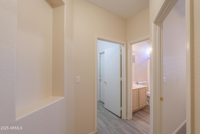 hall featuring light wood-style flooring