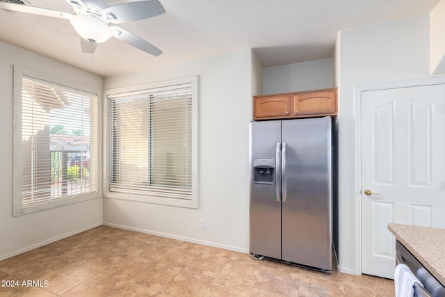 kitchen featuring ceiling fan and appliances with stainless steel finishes