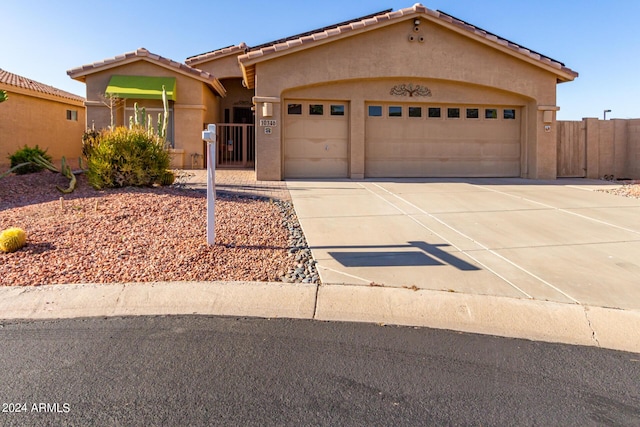 view of front of home with a garage