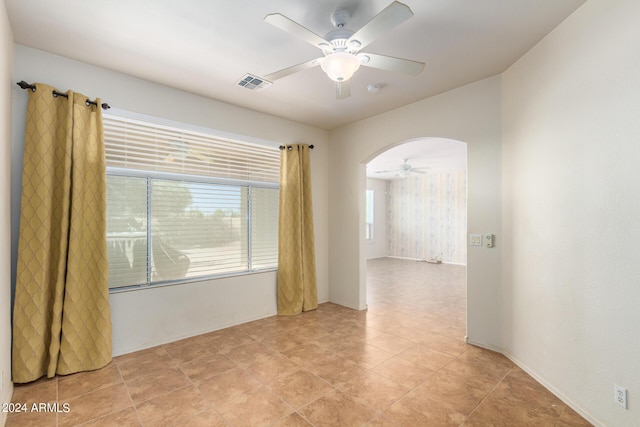 empty room with ceiling fan