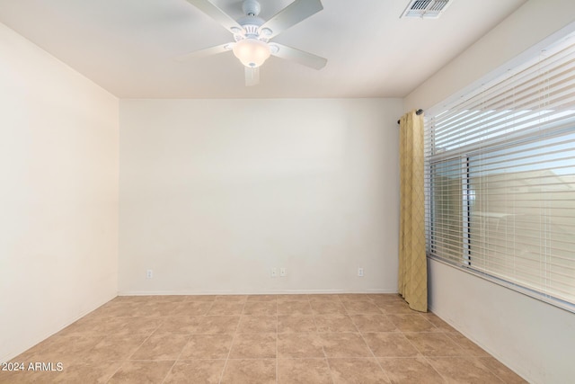 unfurnished room featuring ceiling fan