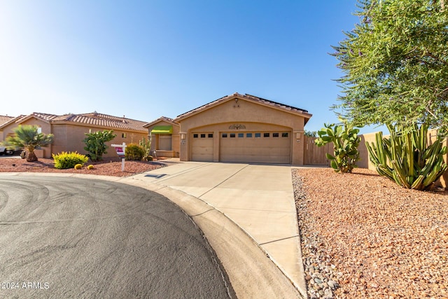 view of front of property featuring a garage