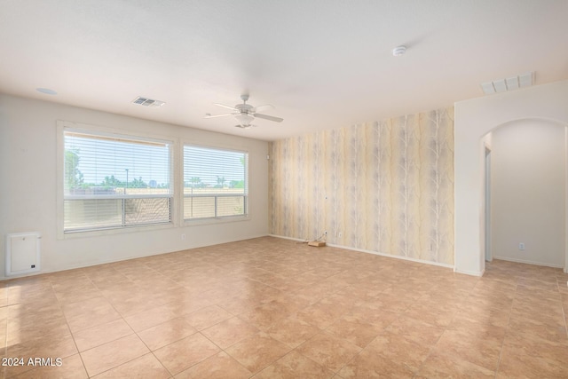 spare room featuring ceiling fan