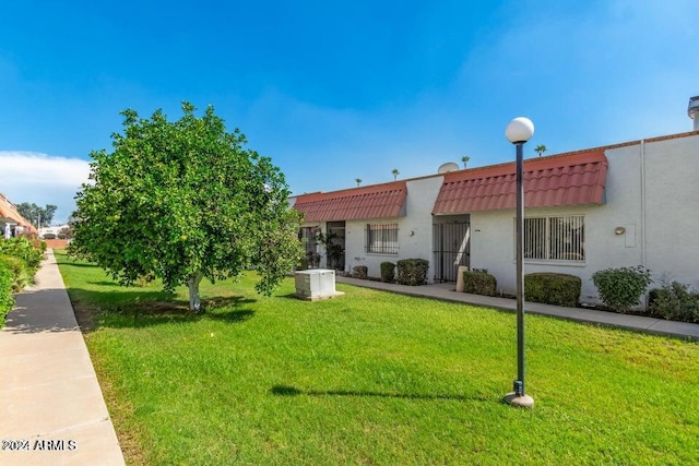 exterior space featuring a yard