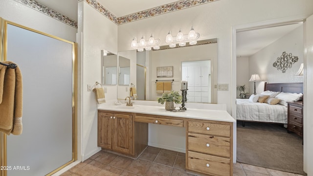 full bathroom featuring a stall shower, tile patterned flooring, connected bathroom, and vanity