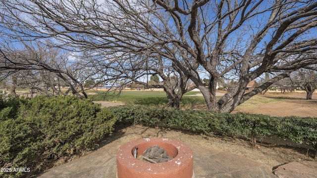 view of patio / terrace featuring a fire pit