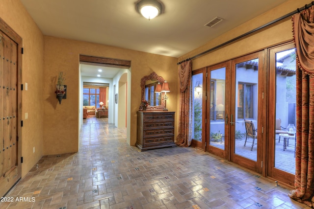 entryway featuring french doors