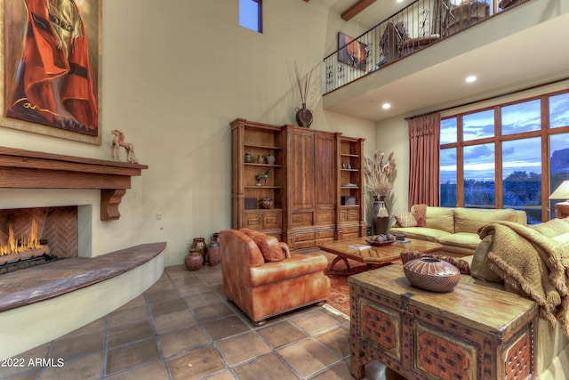 living room featuring a high ceiling