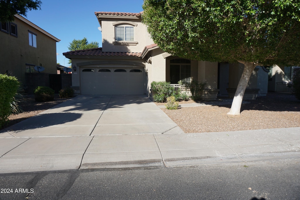 view of front of home with a garage