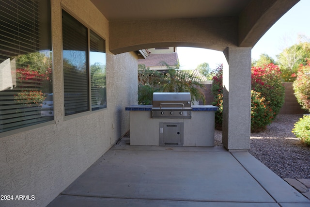 view of patio / terrace with area for grilling and exterior kitchen