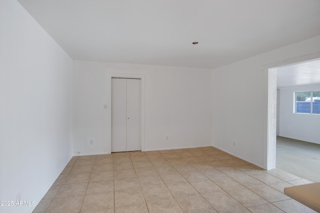 view of tiled spare room