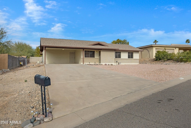 single story home with a carport