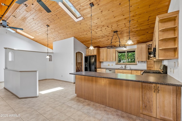 17620 Littlefield Pl, Munds Park, AZ 86017 - kitchen featuring black refrigerator with ice dispenser, ceiling fan, range, dark countertops, and wooden ceiling