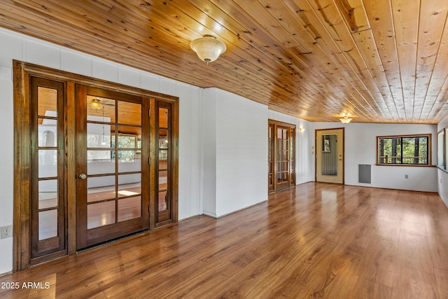 17620 Littlefield Pl, Munds Park, AZ 86017 - spare room featuring french doors, wood ceiling, and wood finished floors