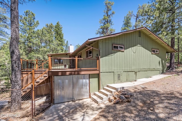 17620 Littlefield Pl, Munds Park, AZ 86017 - rear view of property with stairway, a wooden deck, a chimney, and crawl space