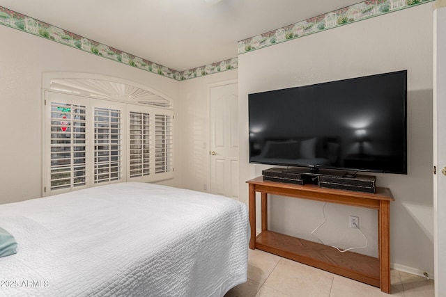 bedroom with tile patterned flooring