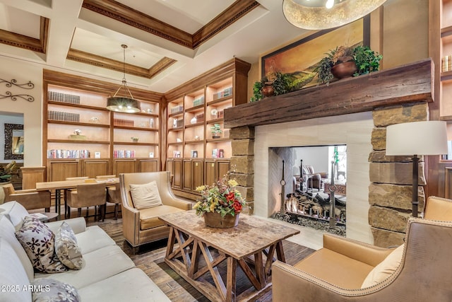 living room featuring beamed ceiling, ornamental molding, built in features, coffered ceiling, and wood finished floors