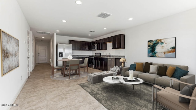 living room with light tile patterned floors