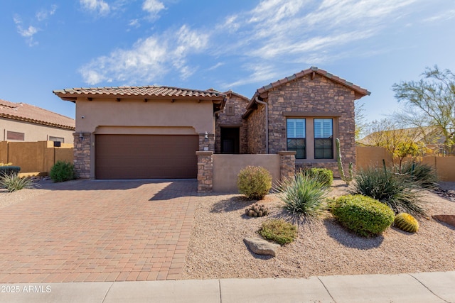 view of front of home with a garage