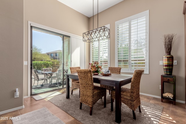 dining area featuring light tile patterned floors