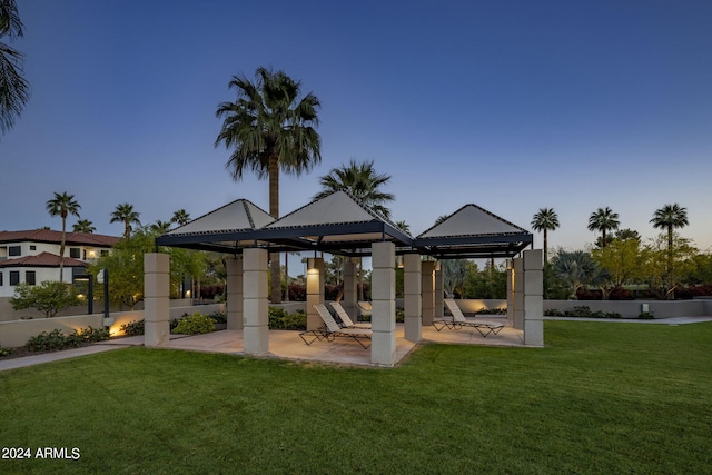 view of nearby features featuring a patio, a lawn, and a gazebo