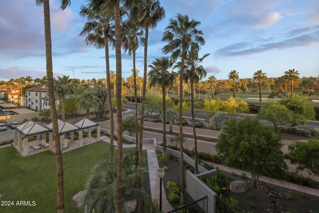 view of yard at dusk