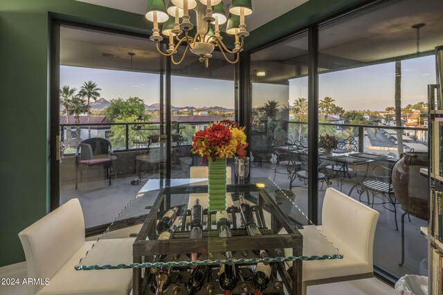 dining room with a notable chandelier