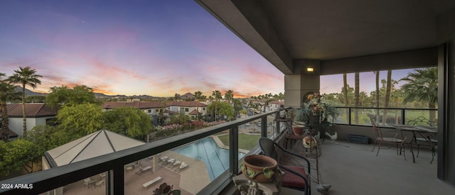 view of balcony at dusk