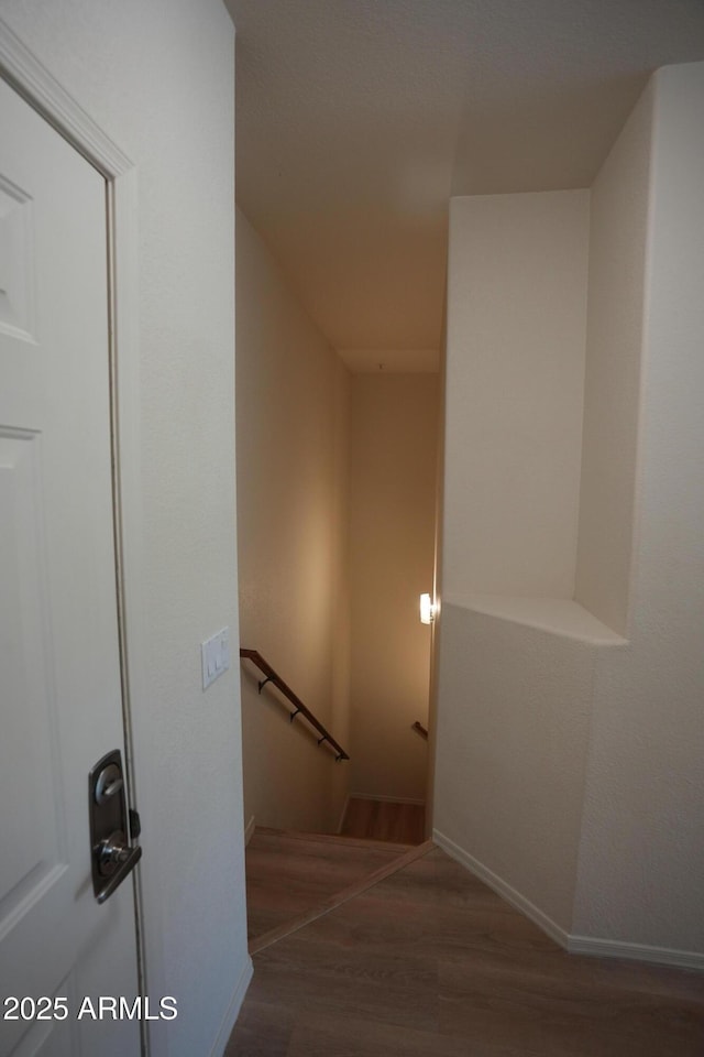435 W Rio Salado Pkwy Unit 210, Tempe, AZ 85281 - stairway featuring baseboards and wood finished floors