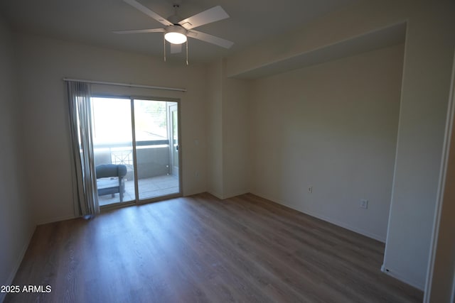 435 W Rio Salado Pkwy Unit 210, Tempe, AZ 85281 - unfurnished room featuring wood finished floors, a ceiling fan, and baseboards