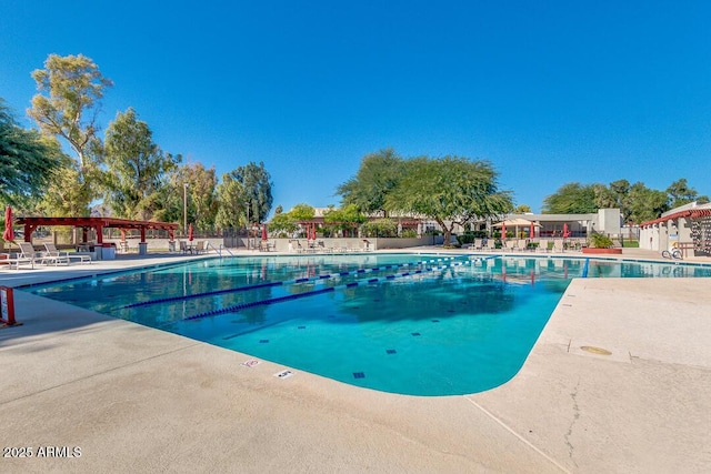 view of swimming pool featuring a patio area