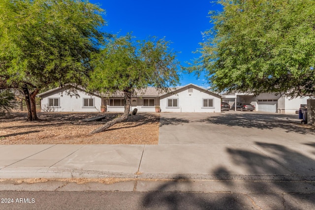 single story home with a garage