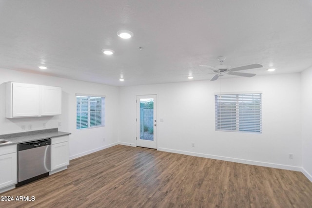 kitchen with dishwasher, hardwood / wood-style floors, white cabinetry, and ceiling fan