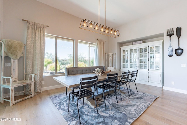 dining space featuring light hardwood / wood-style flooring