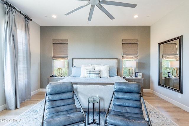 bedroom featuring ceiling fan and light wood-type flooring