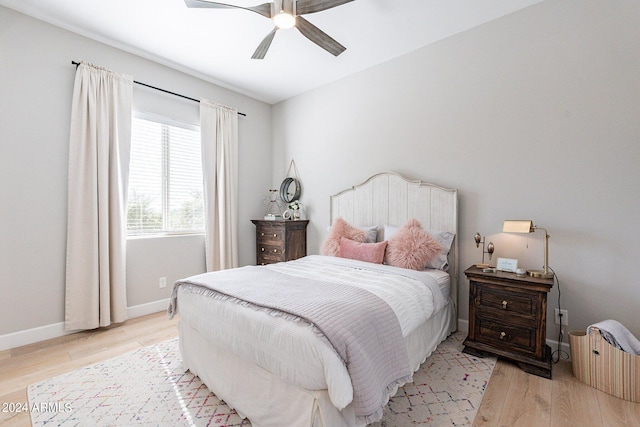 bedroom featuring ceiling fan and light hardwood / wood-style flooring