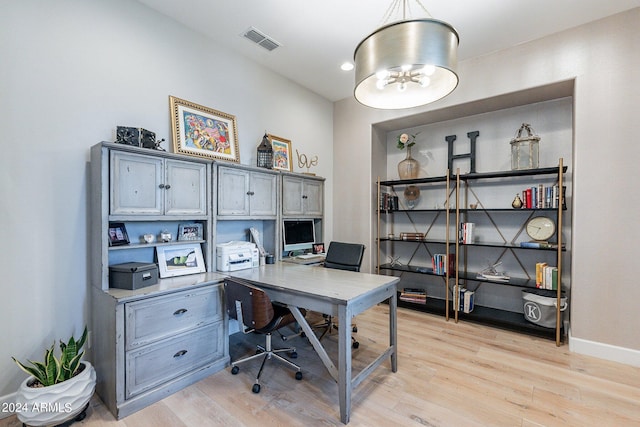 office space featuring light hardwood / wood-style floors