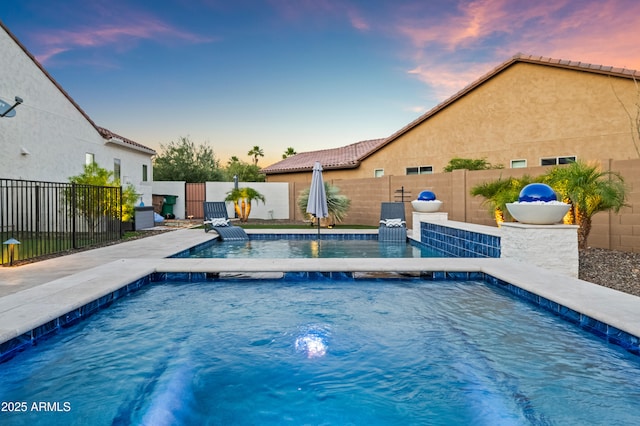 16987 W Princeton Ave, Goodyear, AZ 85395 - view of pool with an in-ground hot tub and a fenced backyard