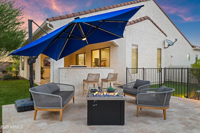16987 W Princeton Ave, Goodyear, AZ 85395 - view of patio featuring an outdoor living space with a fire pit